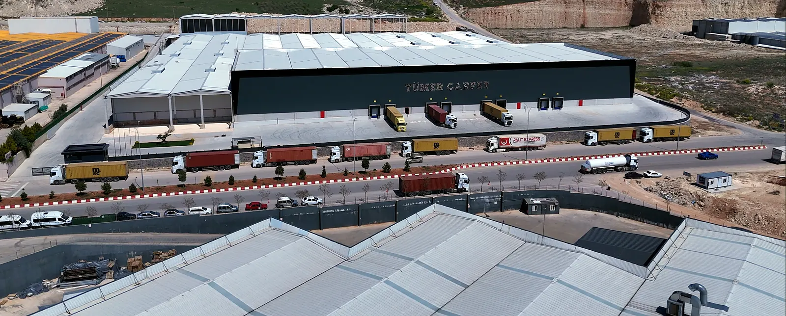 Aerial view of the factory and solar roofs