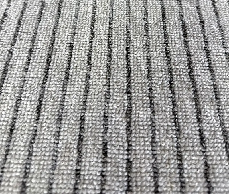 Line loop pile carpet with a fine stripe