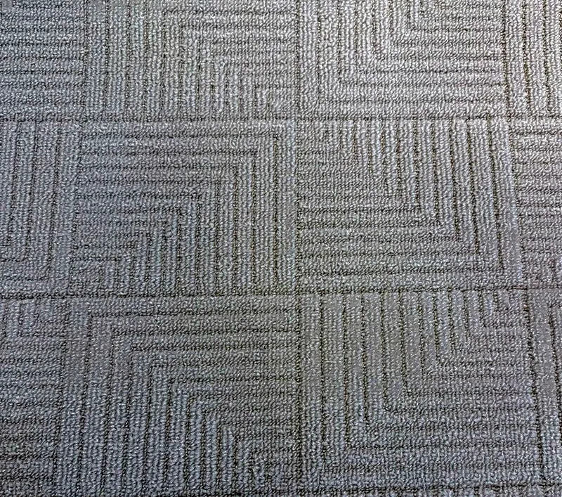Remix scroll loop carpet with a sculptured square pattern