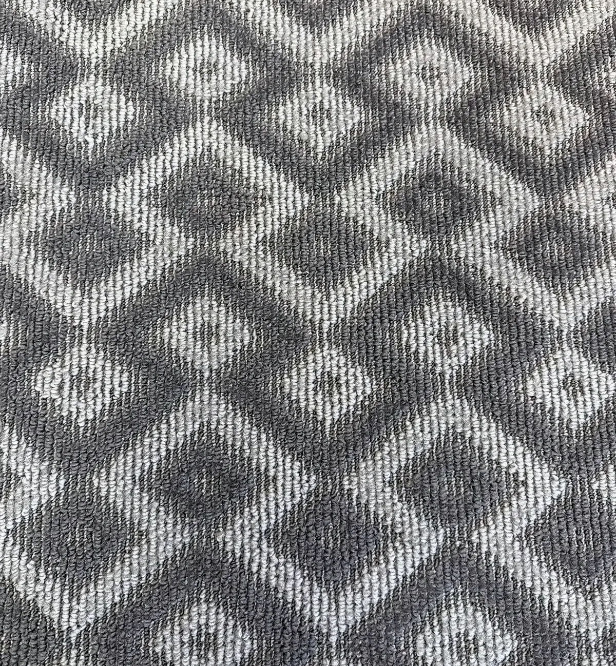 Sky scroll loop carpet with a sculptured diamond pattern